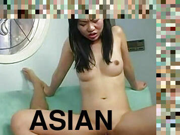 Asian chick is riding on the horny dick