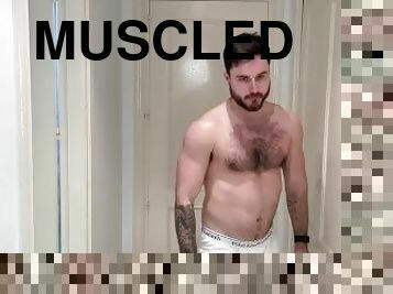 Flexing and burping muscular jock