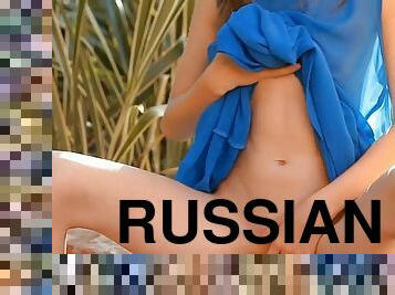 Attractive blonde Russian slut Gloria strips on cam