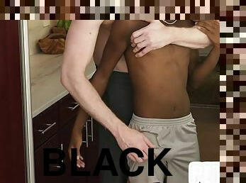 Black twink is happy to feel a white cock in his ass