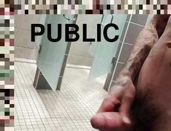 Jerking my cock off in the gym showers till i bust a load