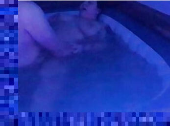 Bouncing big tits in hot tub