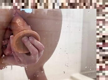 Masturbating with my clear dildo on the shower door ????
