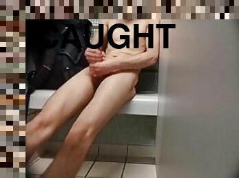 Moaning Twink caught masturbating in the public lockers