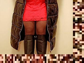 Crossdresser Tranny in Latex coat, and red dress Masturbate. 