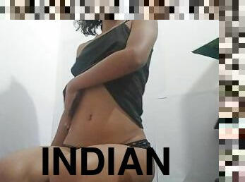 A sexy and cute Indian girl undressing