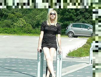 Crossdresser in short Dress outside