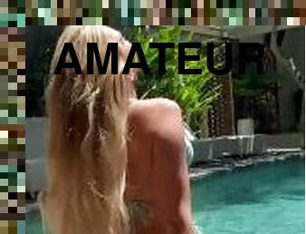 Petite blonde big ass sat poolside