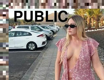 girl walks down the street without panties and bra in public