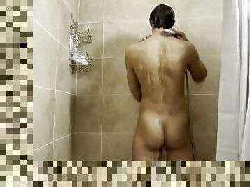 Aleksandr washes in the shower and shakes his huge cock