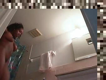 Hidden cam films black girl after a shower