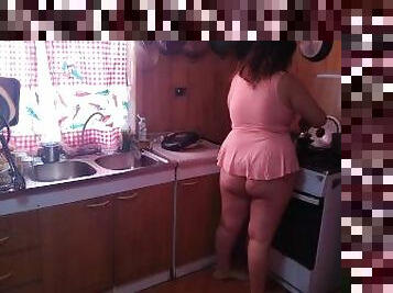Chubby stepmom cooking while showing off her beautiful legs