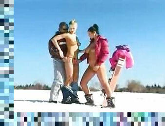 Sexy sluts in the snow do a threesome