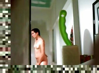 Pretty girl showers in a voyeur video