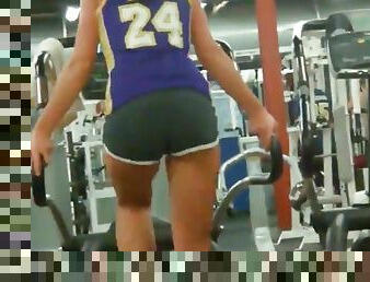 Tight ass girls on cardio machines at the gym