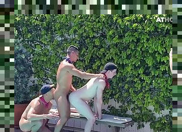 Outdoor athletic studs enjoy a bareback orgy in the pool