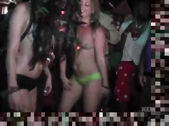 Topless girls shake their asses at Mardi Gras