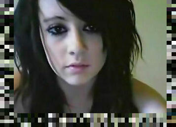 Dark-haired emo is poking her shaved pussy