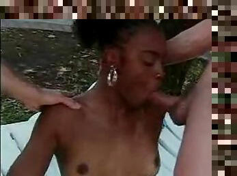 Slim black girl fucked by two guys outdoors