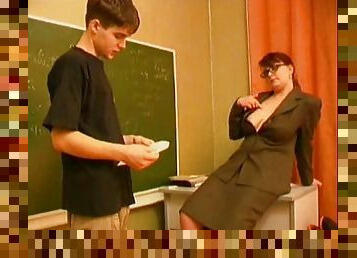 Mature teacher is seducing her student