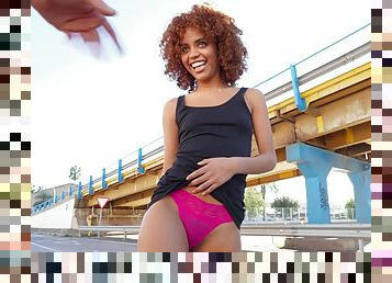 Curly ebony doll removes panties to try white dick inside