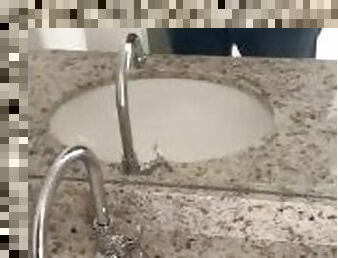 broker urinates in the sink and masturbates before the client arrives