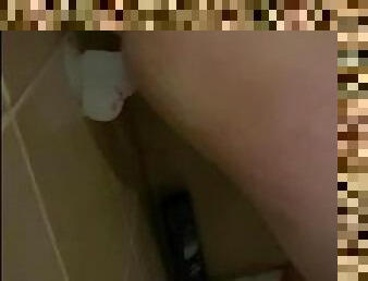 Riding my dildo in the shower then cumming on it