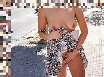 Shows pussy and tits while walking around the city